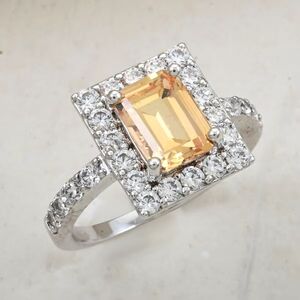 Elegant Simulated Yellow Sapphire And Diamond Ring In Silvertone
